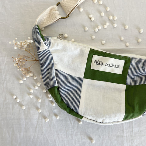 Handmade Moonbag with Green, white, and blue patches.