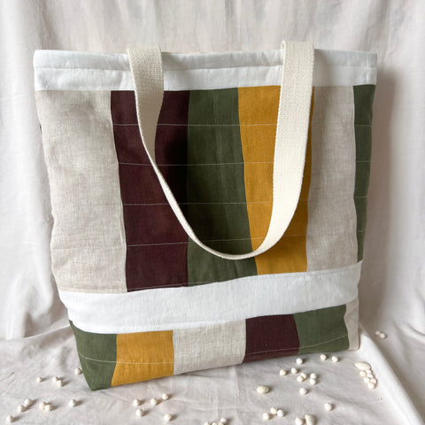 Tote bag with geometric pattern on a white background