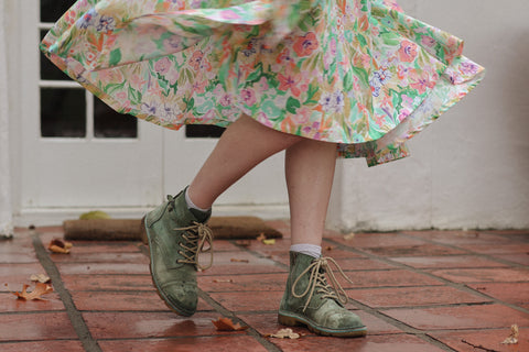 woman spinning in springtime sisterhood dress