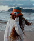 Patchwork Bucket Hat presented at the beach in Cape Town.