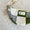 Handmade Moonbag with Green, white, and blue patches.