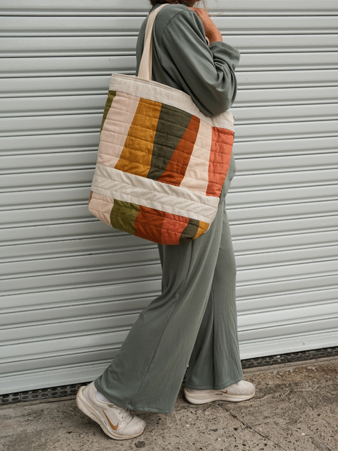 Quilted Tote combined with Not I But We's clothing line