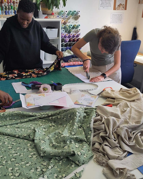 Students sewing their own wrap pants