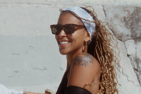 White Shweshwe Headband worn by a young lady with a tattoo