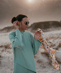 Cadetblue Unbalanced Knit Sweater presented from the front