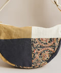 close up pistachio navy white and paisley patchwork bag