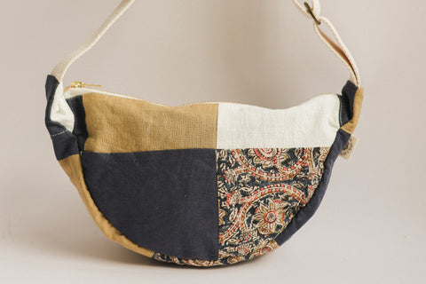 close up pistachio navy white and paisley patchwork bag