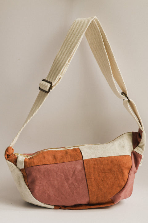 mauve-rust-crossbody-bag on white background