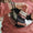 woman opening patchwork moon bag