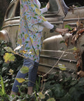 woman wearing kimono next to old car