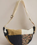 Patchwork bag with a mix of colors on a beige background