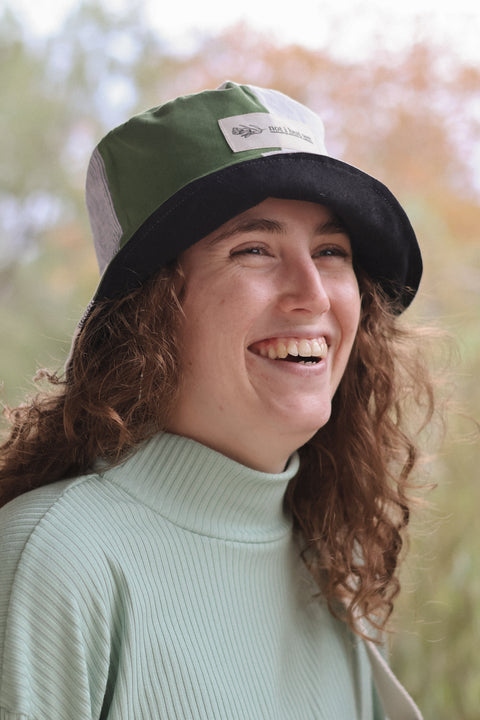 woman wearing patchwork bucket hat