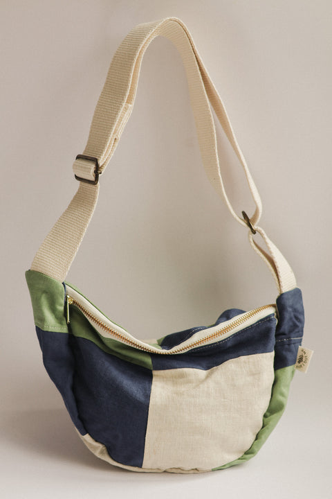 sage navy beige patchwork crossbody bag on white background