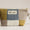 Patchwork pouch with a visible brand label on a light background