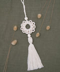 white macrame tassel ornament