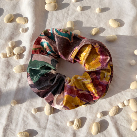 colourful velvet scurnchie on white background